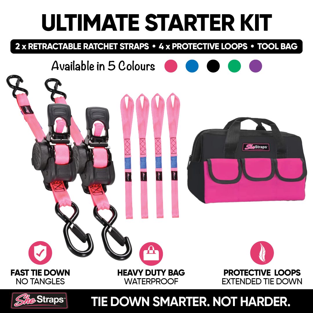 Ultimate Starter Kit by SheStraps featuring two retractable ratchet straps, four protective loops, and a tool bag in pink and black, displayed on a white background with feature icons and color options.