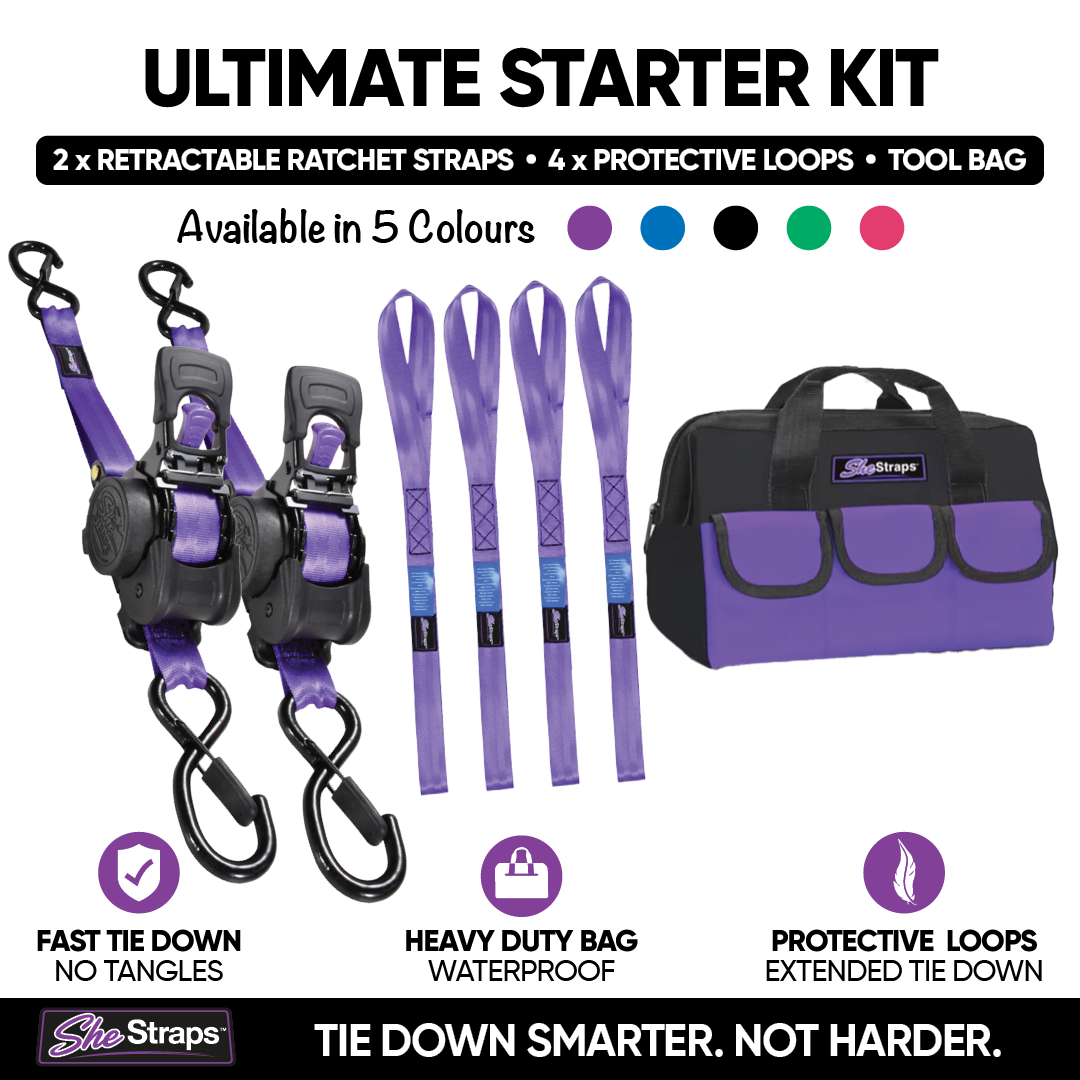 Ultimate Starter Kit by She Straps featuring two purple and black retractable ratchet straps with S hook clips, four purple protective / anchor straps, a black and purple tool bag, and text highlighting product features and available colors.